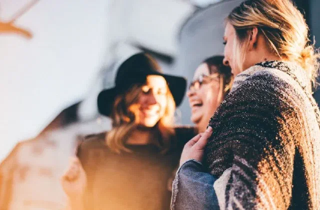 A group of smiling female friends